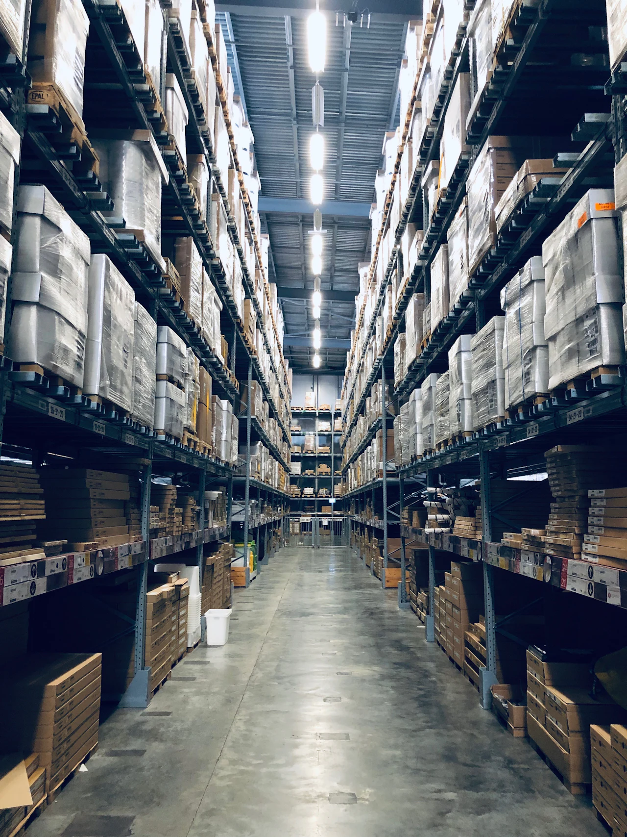 Pallets and goods arranged inside a freight warehouse